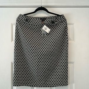 Black and Cream color Skirt with buttons